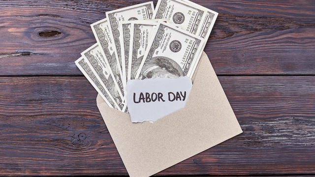 Dollars in envelope and card. 
